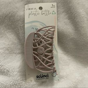 Scunci Jaw Clip was a plastic bottle pink/purple